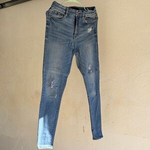 High-Rise Light Blue Distressed Skinny Jeans
